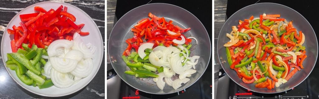 Sliced red and green bell peppers with onion cooking in a pan.