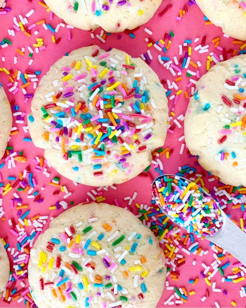 Close-up of homemade cookies packed with sprinkles, showcasing an easy and delicious cookie recipe sprinkles