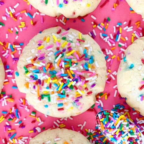 Funfetti cookies on a pink background