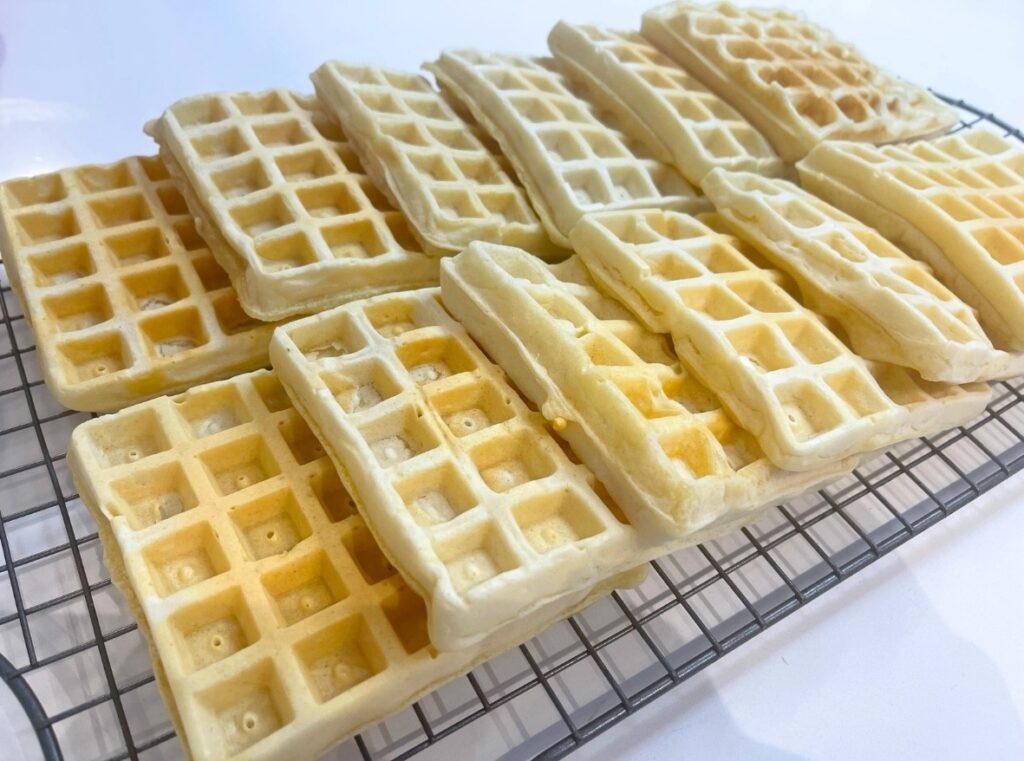 homemade waffles on a tray ready to be enjoyed