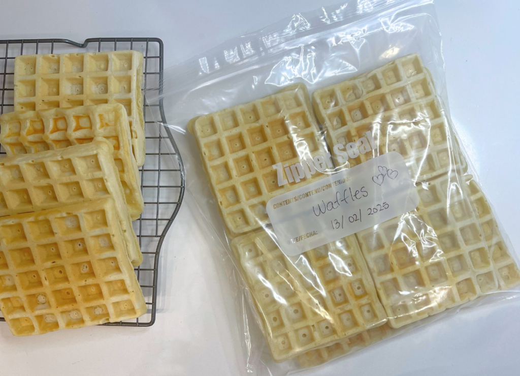 homemade waffles carefully placed in ziplock bag to freeze 