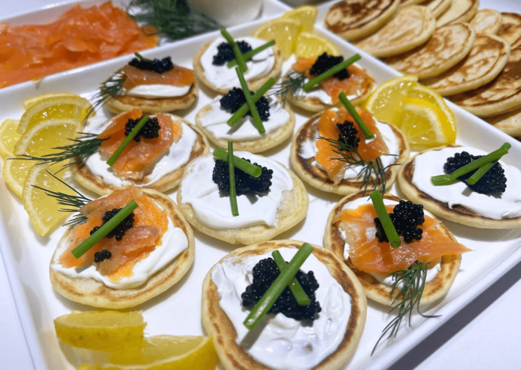 smoked salmon blinis on a platter