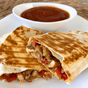 chicken fajita wraps made at home plated and served with salsa