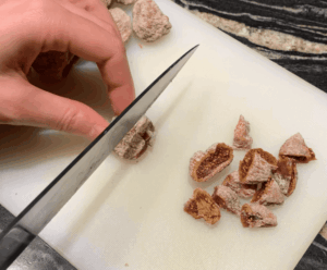 cutting dried figs to make fig jam