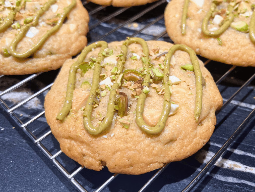 fresh pistachio cookies on a baking tray ready to serve