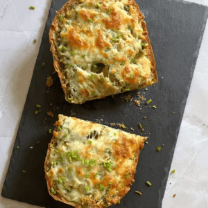 crispy easy cheesy garlic bread served on a platter