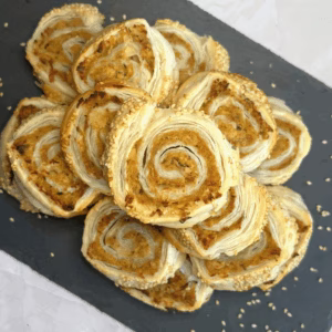 Easy tuna puff pastry rolls served as fancy appetizers for any occasion