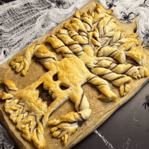 Easy Halloween dessert spooky puff pastry tree on platter