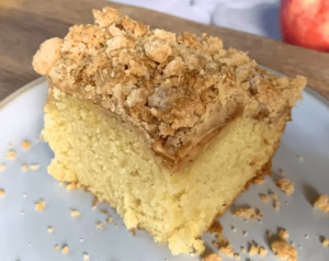 slice of apple crumble cake on a plate