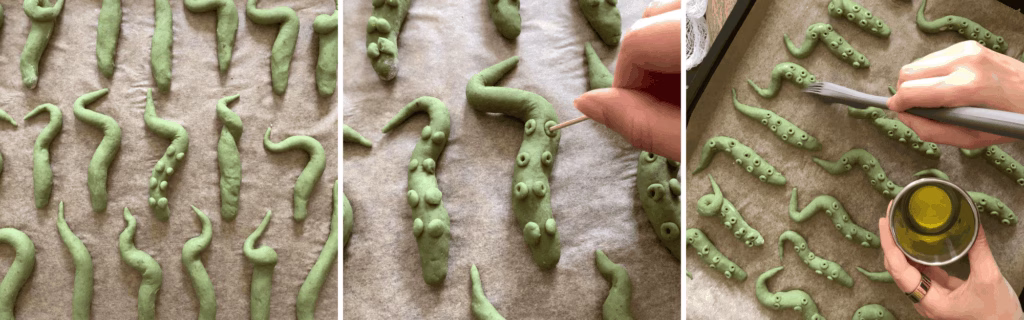 Sweet potato tentacles brushed with olive oil on a baking tray ready for the oven, spooky Halloween snack.