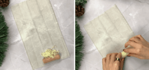 Phyllo sheets cut in half with a hot dog and shredded cheese placed at one end before rolling.