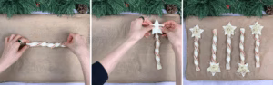 Twisted pastry sticks topped with puff pastry stars arranged on a baking tray before baking.