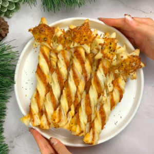 puff pastry christmas appetizers that look like magic wands and are filled like pizza