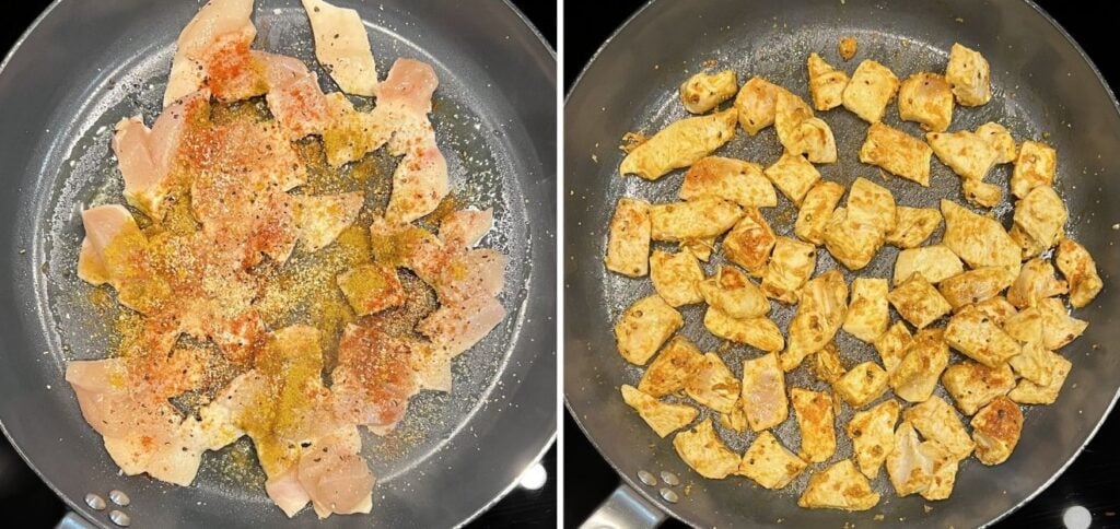 Cubed chicken breast browning in a non-stick pan with spices